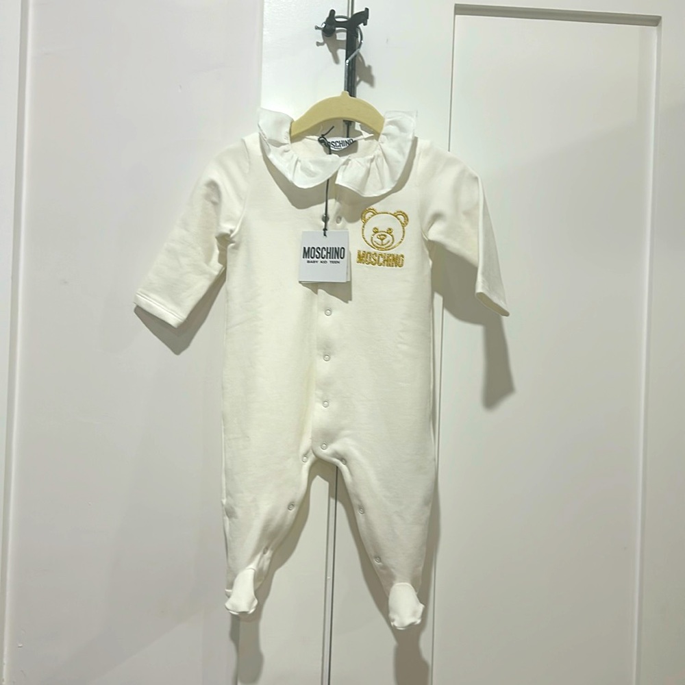 Never worn before Moschino baby onesie!